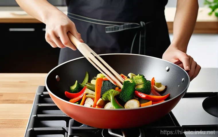 주방 필수 실리콘 뒤집개 추천 - **Modern Culinary Efficiency**: A bright, contemporary kitchen with warm, natural lighting. A person...